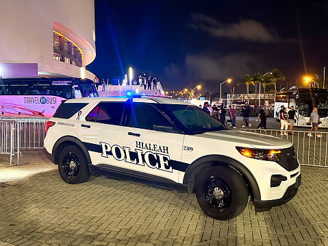 Miami, Florida, USA - 2 December 2023: Police patrol cruiser 4x4 vehicle with flashing lights operated by the Hialeah police department in Miami at night