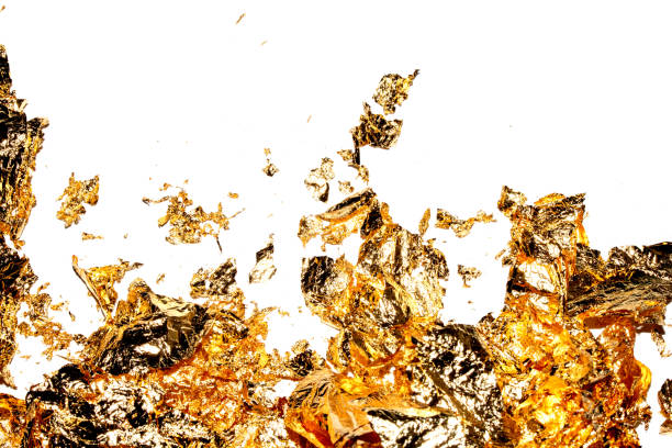 istock Gold Leaf Pieces Close Up on A White Background as Decorative Pieces 1855182978