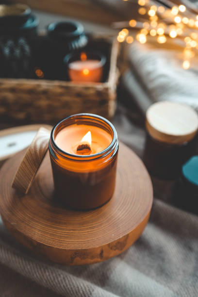 istock Burning candle in a festive cozy interior 1855196699