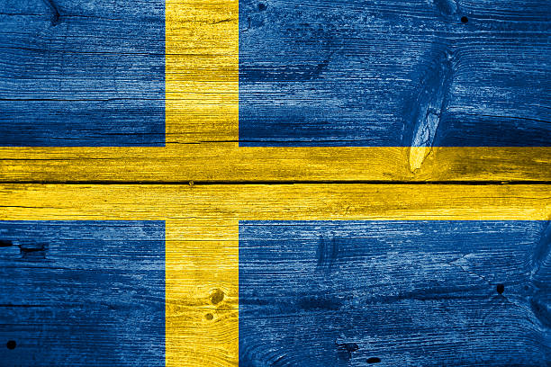 istock Sweden Flag painted on old wood plank background 185520441