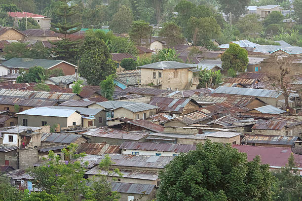 istock Top view on city roofs at hazy dawn 185524116
