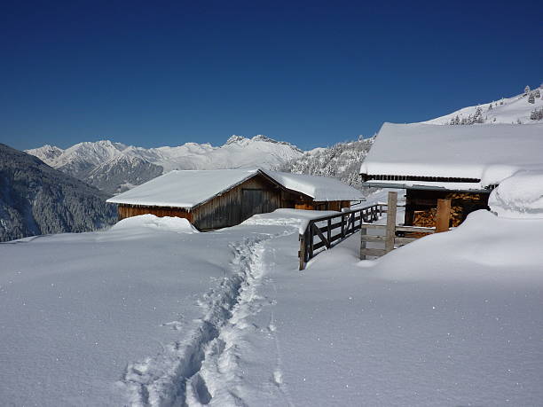 istock Way to the snowy mountain village 185525432