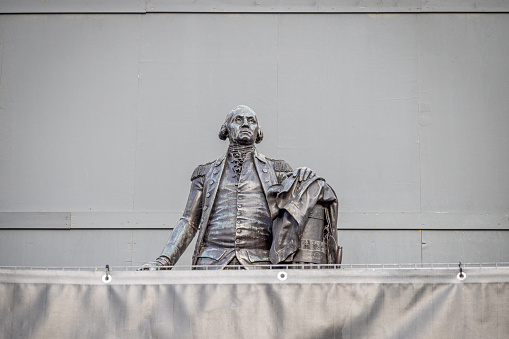 Trafalgar Square, London, England - October 30th 2023:  The famous statue of the American president George Washington was a gift to the British from the state of Virginia in 1921 and is a copy of an American statue