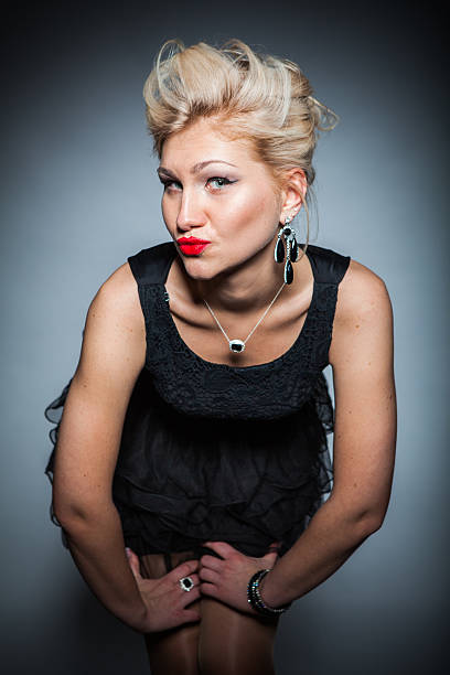 istock beautiful women on dark background 185526317