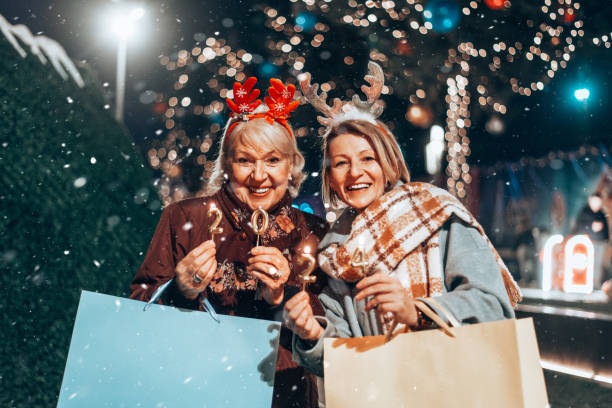 istock Two beautiful senior women celebrates Christmas's. 1855267984
