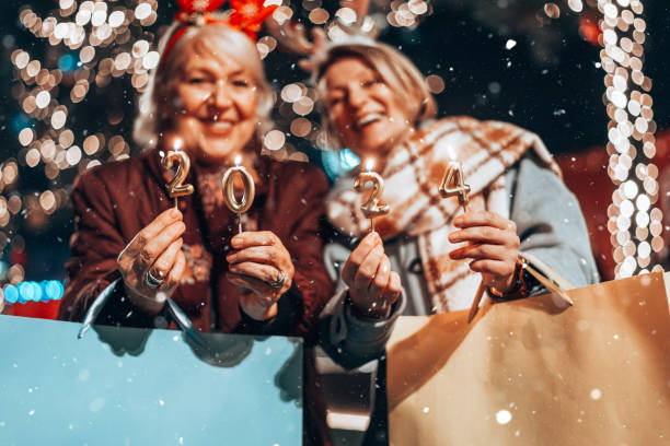 istock Two beautiful senior women celebrates Christmas's. 1855268061