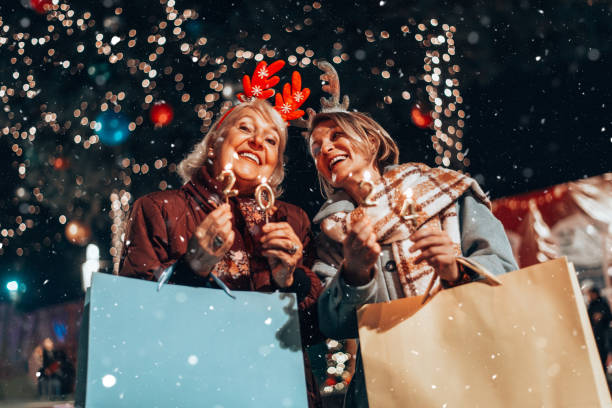 istock Two beautiful senior women celebrates Christmas's. 1855268503