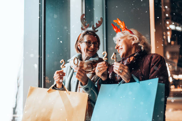 istock Two beautiful senior women celebrates Christmas's. 1855270690