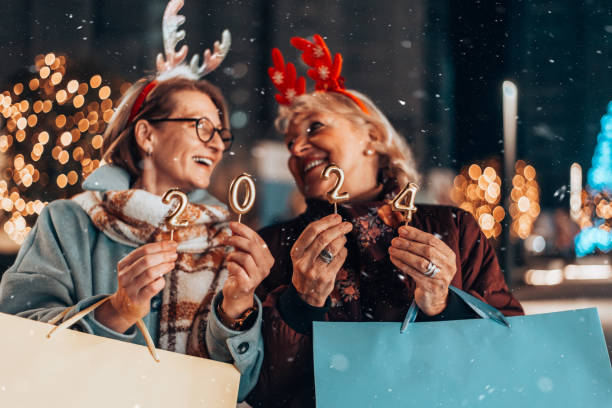 istock Two beautiful senior women celebrates Christmas's. 1855271604