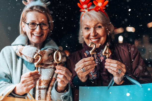 istock Two beautiful senior women celebrates Christmas's. 1855271616