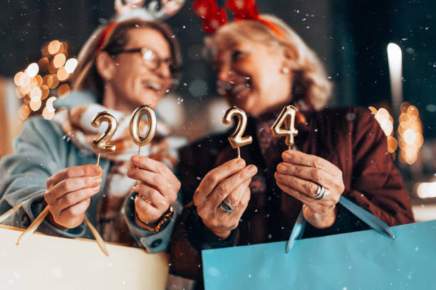 istock Two beautiful senior women celebrates Christmas's. 1855272228