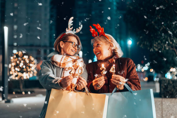 istock Two beautiful senior women celebrates Christmas's. 1855272695