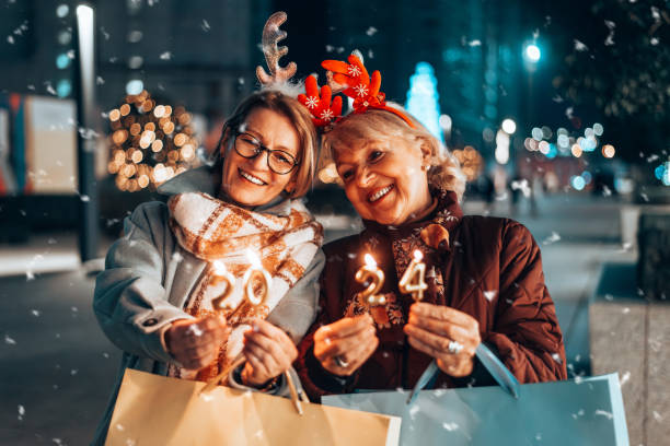 istock Two beautiful senior women celebrates Christmas's. 1855272697