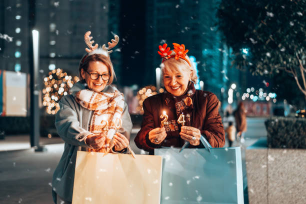 istock Two beautiful senior women celebrates Christmas's. 1855273225