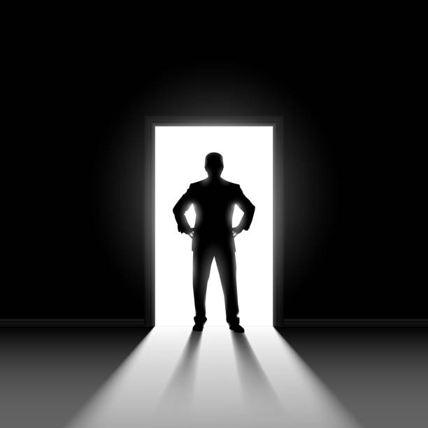 istock Silhouette of man standng in doorway. 185527423