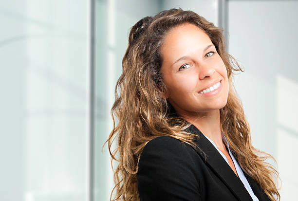 istock Young businesswoman smiling 185527613