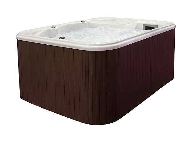 Large hot tub Large hot tub with brown edge isolated with clipping path hot tub stock pictures, royalty-free photos & images
