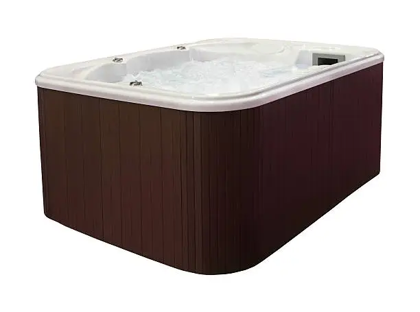 Large hot tub with brown edge isolated with clipping path