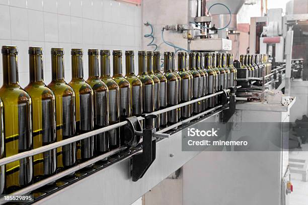 Automatic Wine Bottling Process Stock Photo - Download Image Now - Wine, Packaging, Wine Bottle