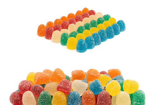 Assorted colorful gummy candies isolated on a white background. Top view. Jelly  sweets.