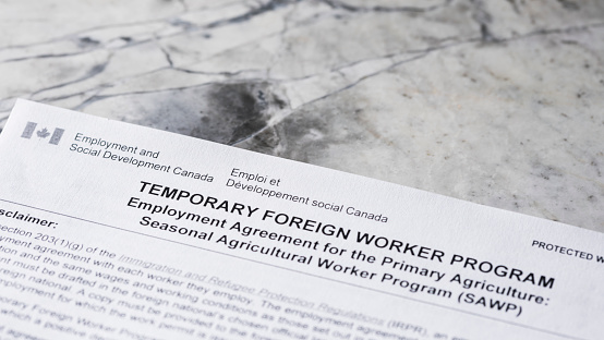 Close up of a Canada Temporary Foreign Worker application form.