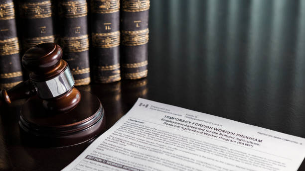 istock Canada Temporary Foreign Worker Application Form with Gavel and Books 1855311248
