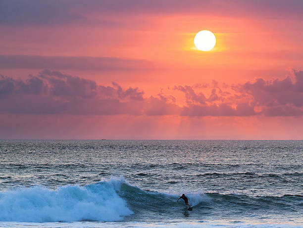 istock Surfer on Blue Ocean Wave in Bali, Indonesia 185531222