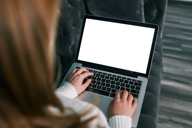 istock computer screen blank mockup.hand woman work using laptop with white background for advertising. marketing and creative design 1855322306