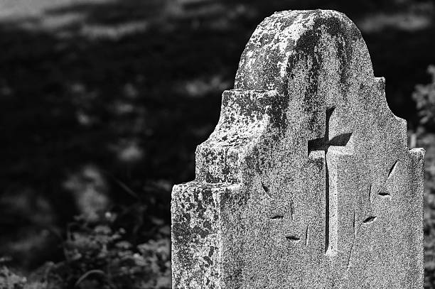 istock Old Tombstone with burial Cross 185532901
