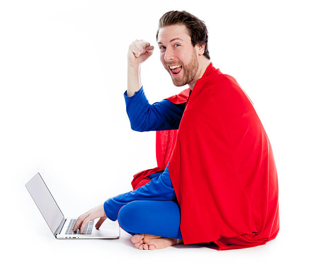istock caucasian man disguised as superman isolated on white 185533316