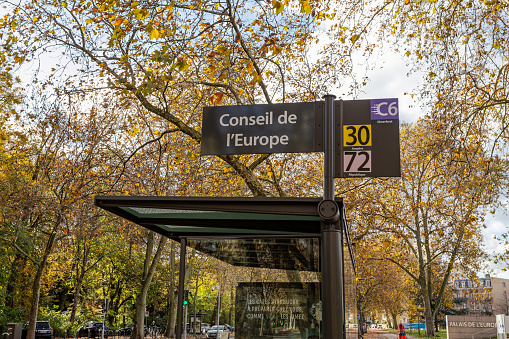 Strasbourg, France - November 11, 2023: Bus stop in front of the Council of Europe in Strasbourg, Bas-Rhin, Alsace, France. Sunny november day.