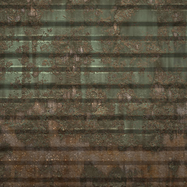istock Rusty metal sheet with cracked green paint 185535114