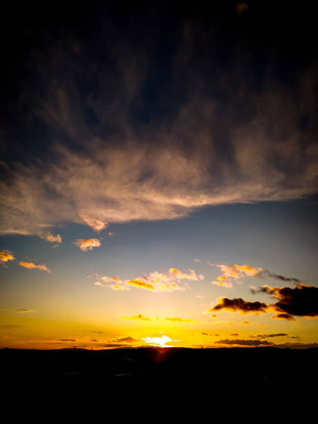 istock Sunset in yellow, blue and black 1855356525