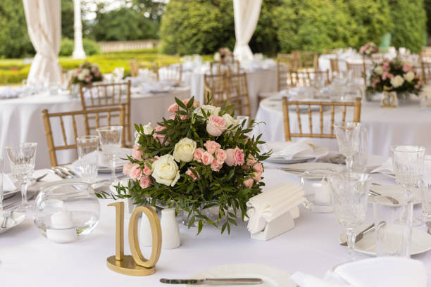 istock Wedding tables setting for dining outdoors. Wedding, decoration, celebration, floral design, holidays concept 1855381060