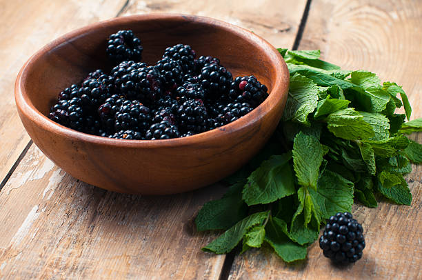 istock blackberries in wooden bowl 185538751