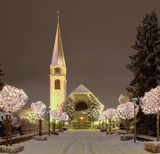 Church and street, illuminated for Christmas stock photo