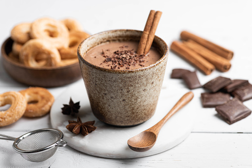 Champurrado, traditional mexican corn drink with chocolate, selective focus