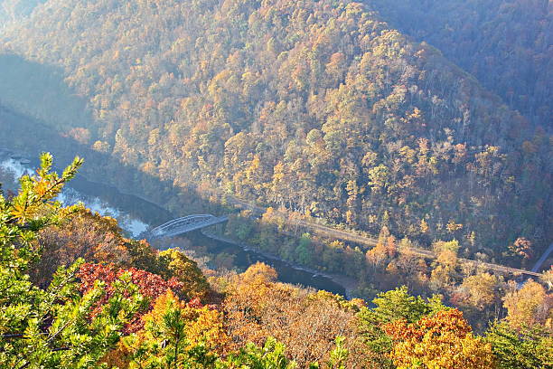 istock Misty morning view through the fog at New River Gorge 185540505