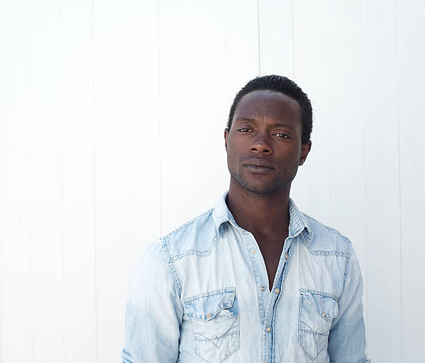 istock African american man posing against white background 185540560
