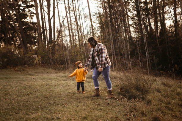 Toddler Girl and Mom Going for a Walk