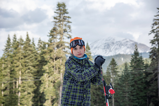 Ski and snow fun. Kids skiing. Child winter sport