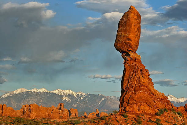 Natural formation in Arches National Park, Utah, USA. La Sal Mountains in the background.