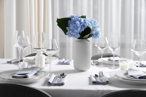 istock Beautiful table setting with floral decor indoors 1855492925