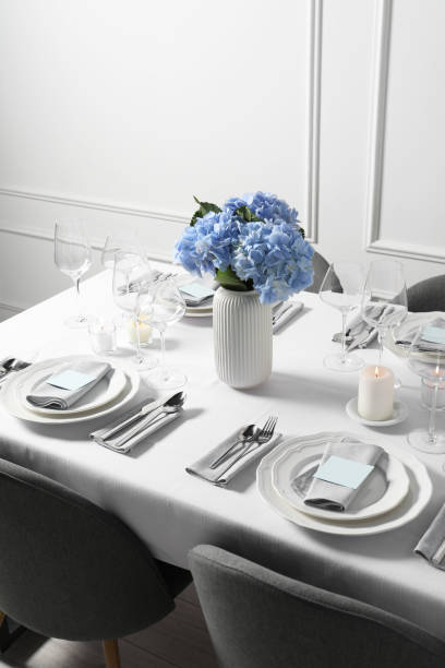 istock Beautiful table setting with floral decor indoors 1855494528