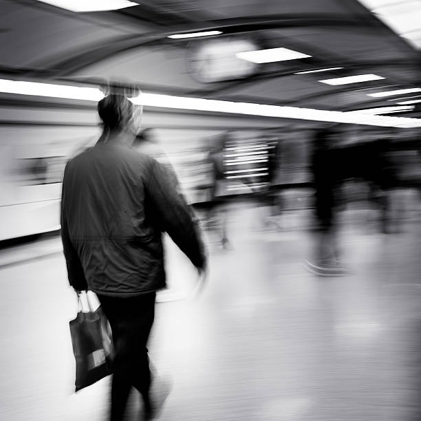 istock business people walk at subway station 185552417