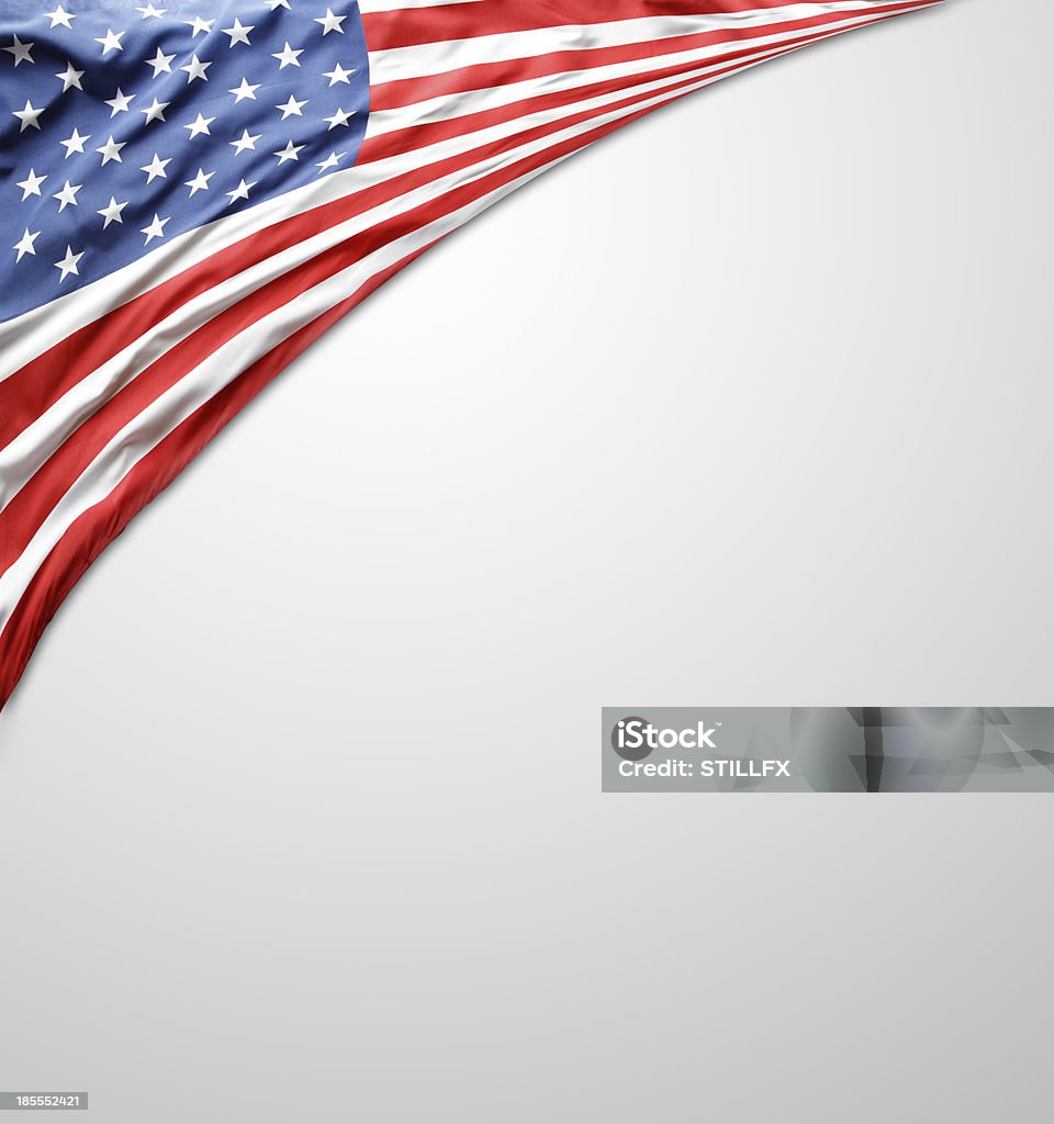 American flag Closeup of American flag on plain background. Advertising copy space below American Flag Stock Photo