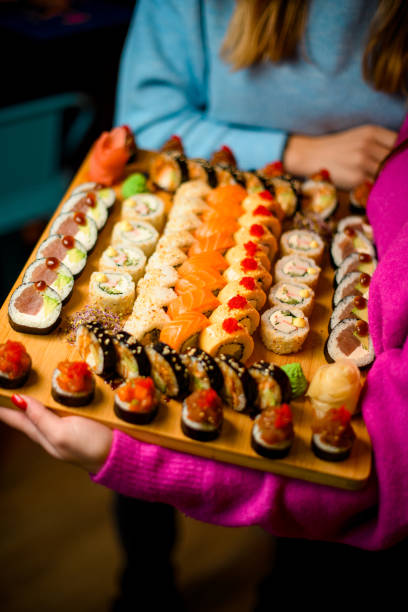 istock Great Sushi Symphony, A Duo's Delightful Holiday Feat 1855532170