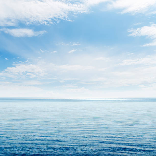 istock blue sea and clouds in sky 185554753