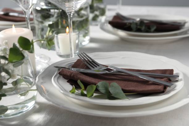 istock Beautiful table setting with silverware and floral decor, closeup 1855557558