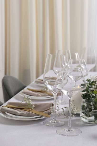 istock Beautiful table setting with floral decor indoors 1855559171